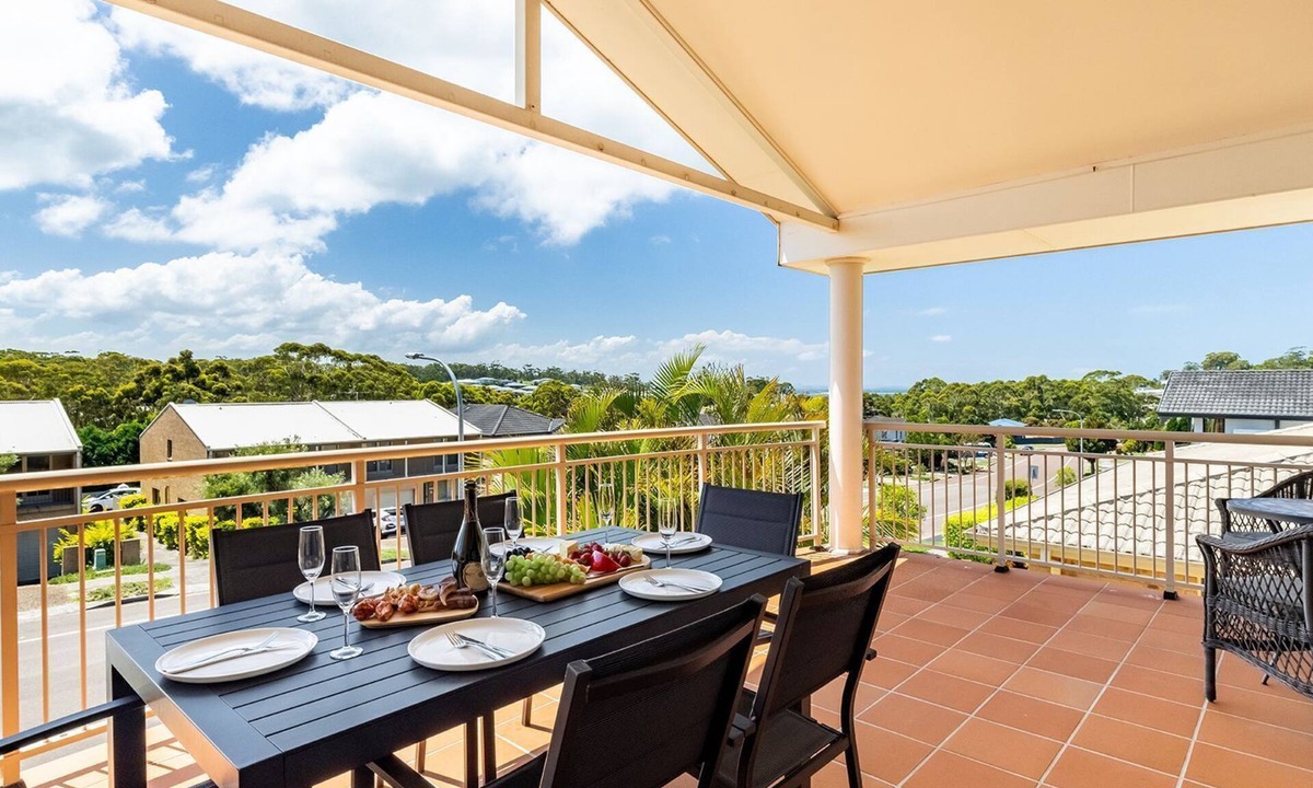 Corlette House | 74A Sergeant Baker Drive - comfortable duplex with beautiful distant water views
