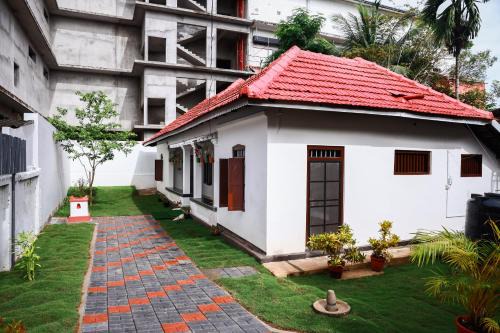 Mullakkal House | Bobbys Corner