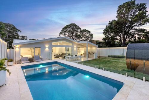 Callala Beach House | Casa Bianca - Fireplace with Swimming Pool