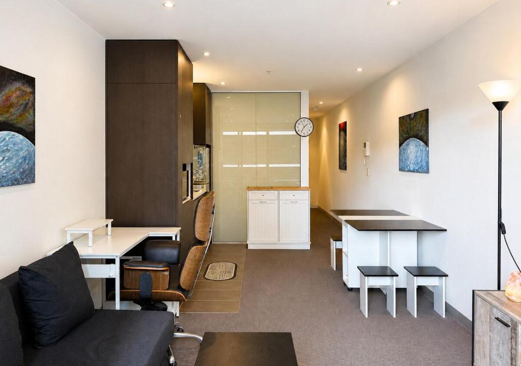 Melbourne Central Business District Apartment | Compact Stay with Balcony, Rooftop & Gym