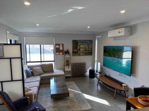 Austral House | Delightful Austral Stay with AC and built-in wardrobe