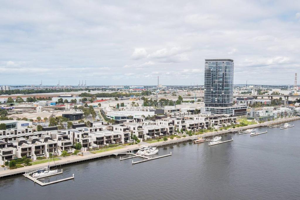 Docklands Apartment | Elevated Waterfront Stay with Indoor Pool and Views