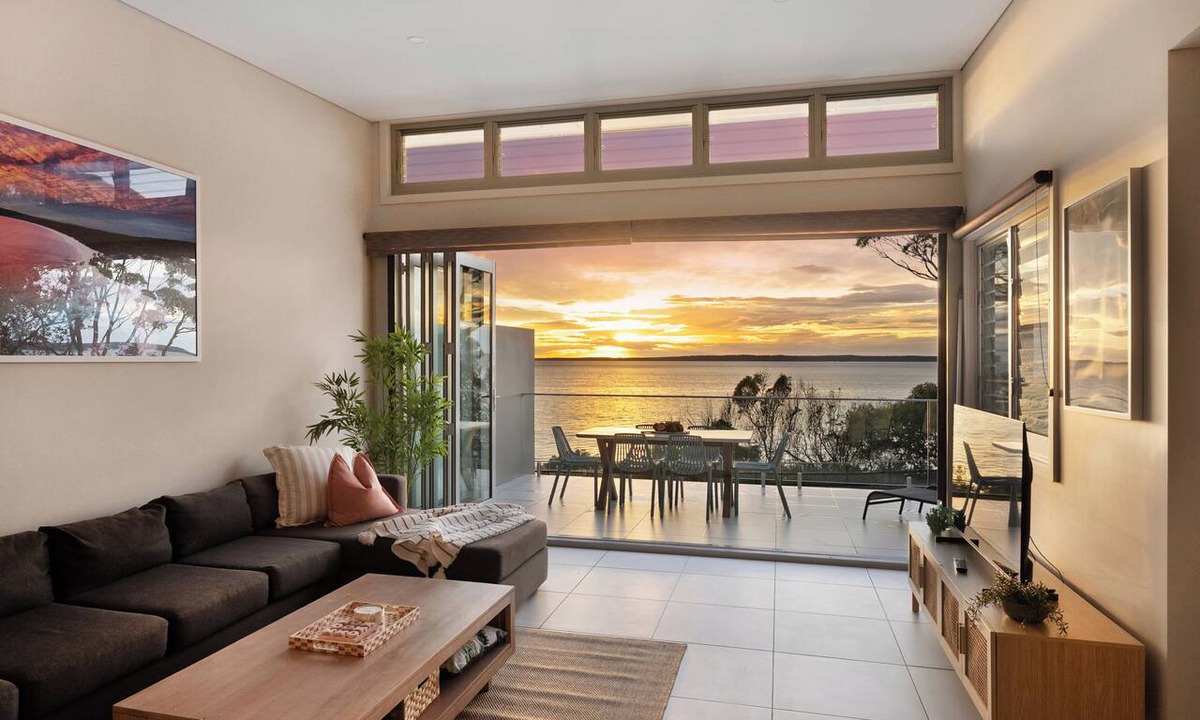 Hyams Beach House | Entice: Panoramic beachfront views. Sunrise views over the ocean at Hyams Beach