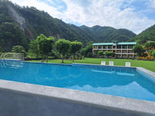 Jakh Resort | Jay Gurudev Pandora River Valley, Corbett