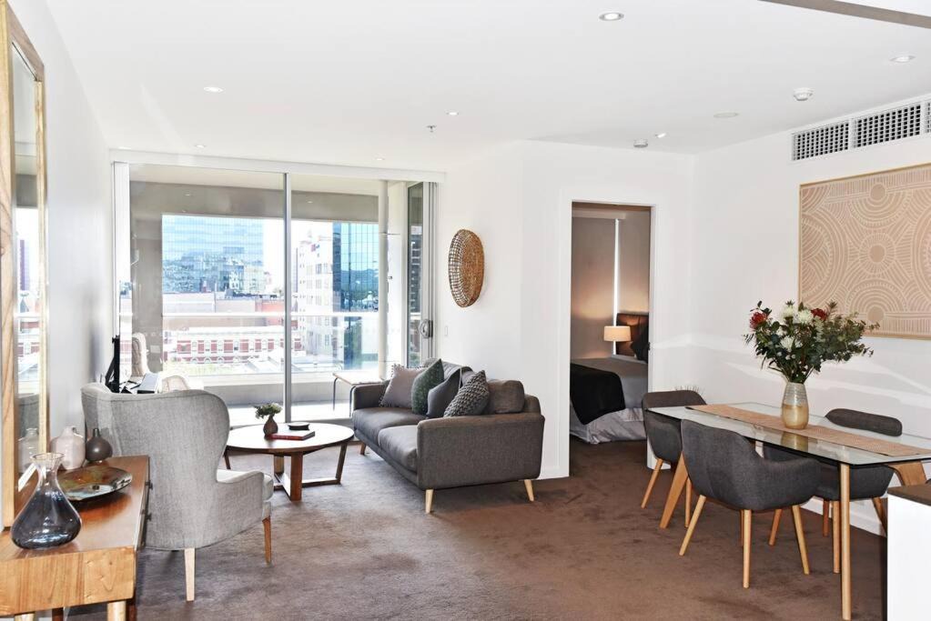 Adelaide Central Business District Apartment | Luxury Overlooking Hindmarsh Sq with Pool & Gym