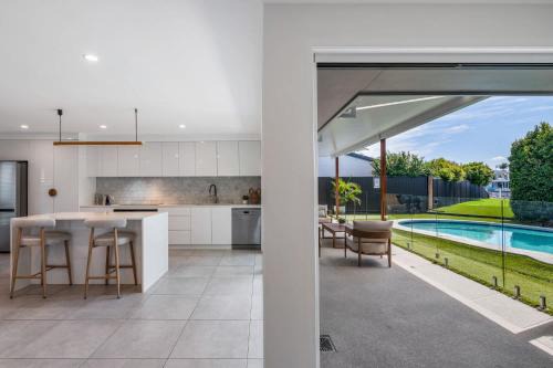 Mooloolaba House | Mooloolaba Canal Retreat with Pool Sleeps 12