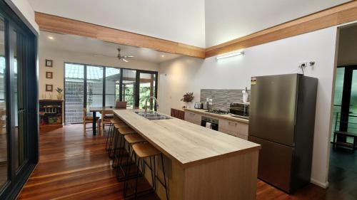 Kuranda House | Rainforest Escape moments from Waterfall