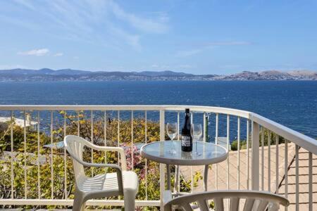Sandy Bay House | Seaside Serenity: Panoramic Waterfront Retreat