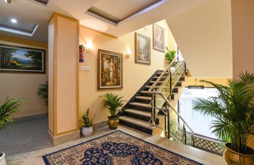 New Town Hotel | FabHotel Prime Familto - Near Bisarjan Ghat