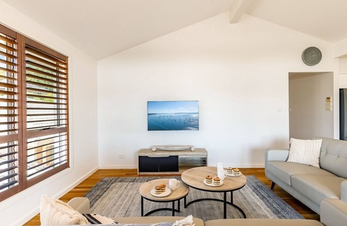 Corlette House | 74A Sergeant Baker Drive - comfortable duplex with beautiful distant water views