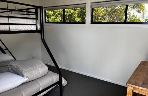 Rainbow Beach House | 76 Cooloola Drive - Rainbow Beach. Aircon. Wifi. Ocean views