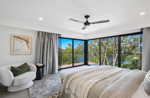 Horsfield Bay House | Aquilae-Waterfront Property Horsfield Bay -firepit,late check out