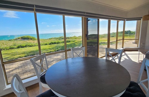 Ledge Point House | Beachfront retreat with breathtaking views steps from the shore.