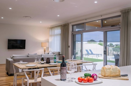Dunsborough House | Ceol Na Mara Luxury Pool Escape with Golf Views