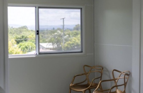 Robertson House | Convenient Comfort: 4BR near Malls and Transport!