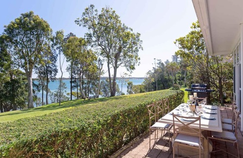 Corlette House | Corlette Waterfront, 2/44 Danalene Parade - Waterfront Luxury, WIFI, Aircon, Boat Parking