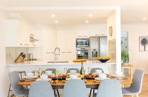 Corlette House | Danalene, 44a Danalene Pde - stunning waterfront property with Air Con, WI-FI, Garage & Boat Parking