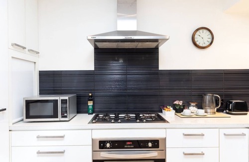 Rapid Creek Apartment | Darwin Style Tropical Luxury Apartment + WARM POOL + Bikes + Pet Croc
