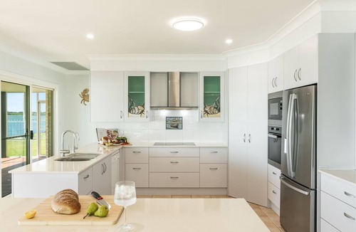 Yamba House | Dolphin View - Elegant Waterfront Haven - Holiday Yamba