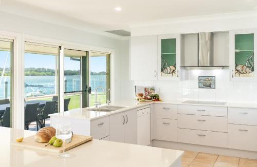 Yamba House | Dolphin View - Elegant Waterfront Haven with Private Pontoon - Holiday Yamba