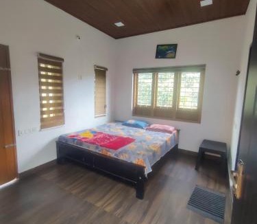 Kalpetta House | Dormitory with attached bathroom