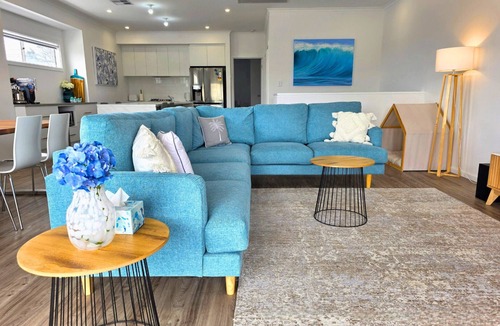 Hayborough House | Driftwood & Daydreams: Modern Coastal with Hillside Views & a Swim Spa