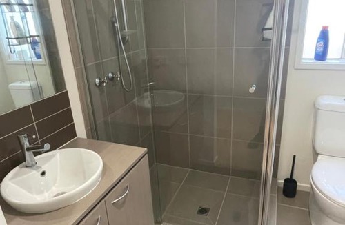 Point Cook House | Elegant master bedroom with private bathroom