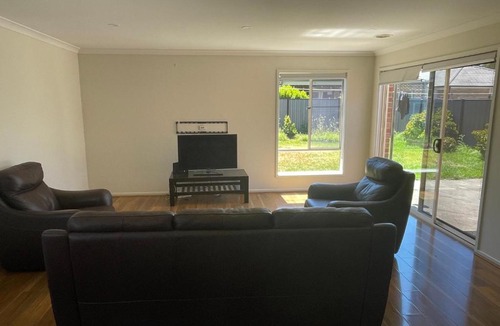 Point Cook House | Elegant master bedroom with private bathroom