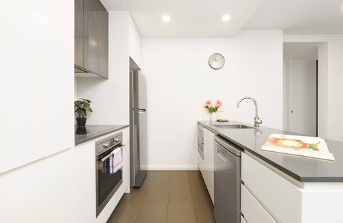 Barton Apartment | Elevated Stay with Refined Interiors and Courtyard