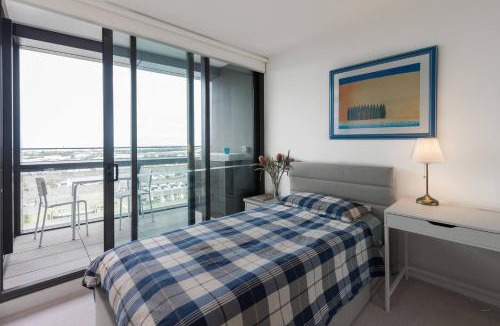 Docklands Apartment | Elevated Waterfront Stay with Indoor Pool and Views