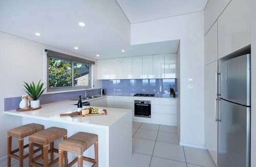 Hyams Beach House | Entice: Panoramic beachfront views. Sunrise views over the ocean at Hyams Beach