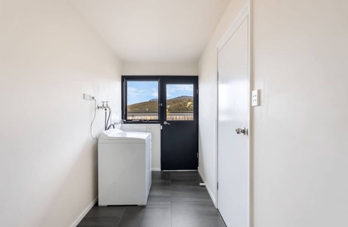 Claremont Apartment | Expansive River-View Oasis