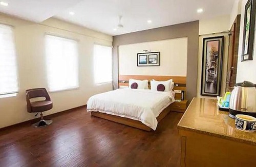 Vadapalani Hotel | FabHotel Prime Adore Residency
