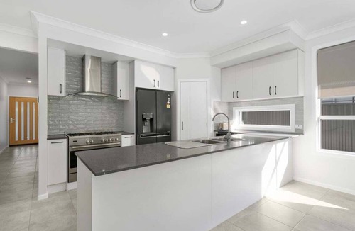 Banksia Beach House | Fishers' Tee Time Home