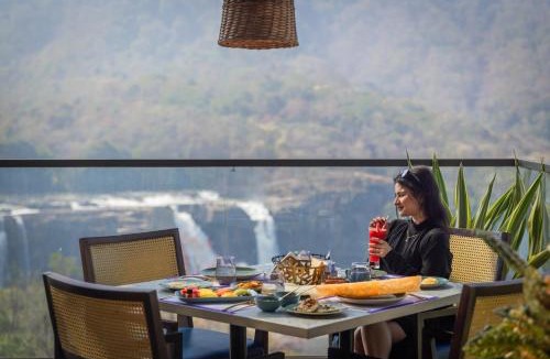 Perumbavoor Resort | Flora Misty Falls Athirappilly