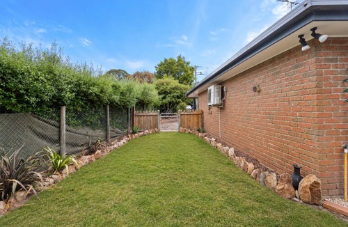 Rosebud House | Golfside Getaway 2 by Ready Set Stay