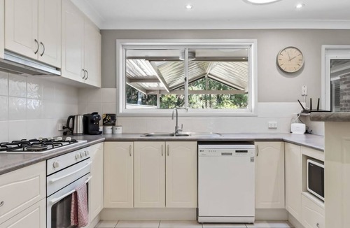 Corlette House | Halyard Beach Haven Dive into Bliss