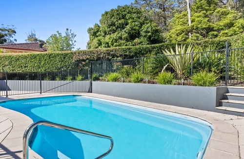 Corlette House | Halyard Beach Haven Dive into Bliss