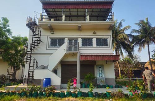 Diamond Harbour House | Holy Island guest house gangasagar