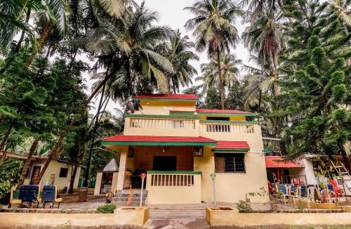 Palghar Hotel | Hotel O Nisarg Resort Satpati Beach