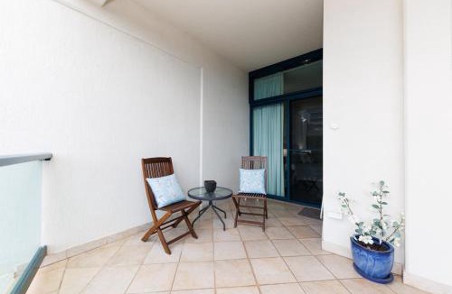 Darwin City Centre Apartment | Ideal CBD Location with Harbour Views Pool Gym & BBQ