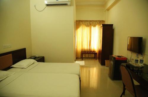 Irinjalakuda Hotel | Kallada Residency