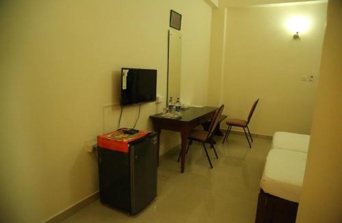 Irinjalakuda Hotel | Kallada Residency