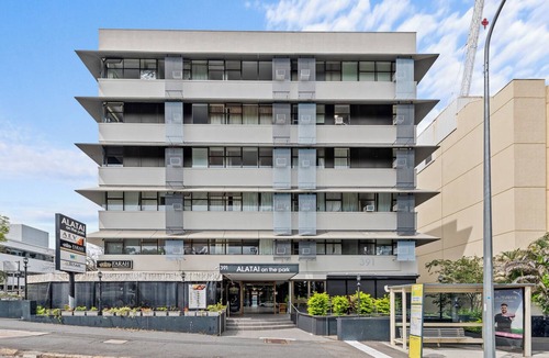 Spring Hill Apartment | Mediterranean Style Steps from the CBD