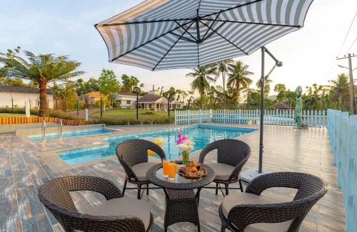 Mudigere Villa | Misty Barn - "Your Poolside Escape Awaits"