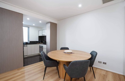 City East Apartment | Modern 1-Bed Unit with Pool Views and Balcony