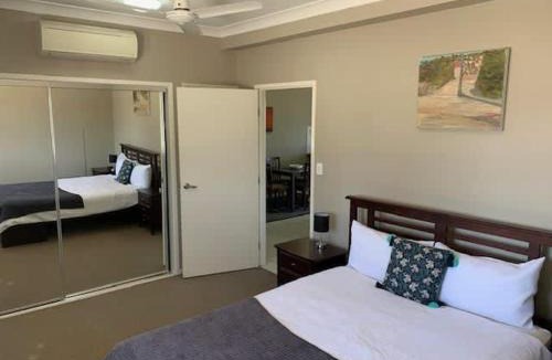 Barney Point Apartment | Modern Beach Apartment