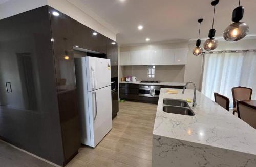 Burnside House | Modern Burnside Family Retreat in Modeina Estate