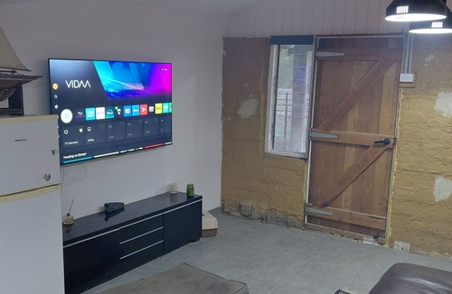 Mandurang South Apartment | Mudbrick self contained studio with wood heater
