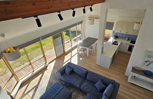 Ledge Point House | Oceanfront retreat with breathtaking views steps from the shore.
